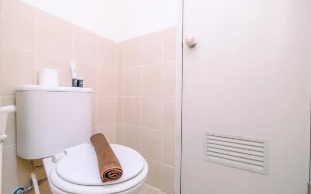 Homey and Modern 2BR at Podomoro Golf View Apartment