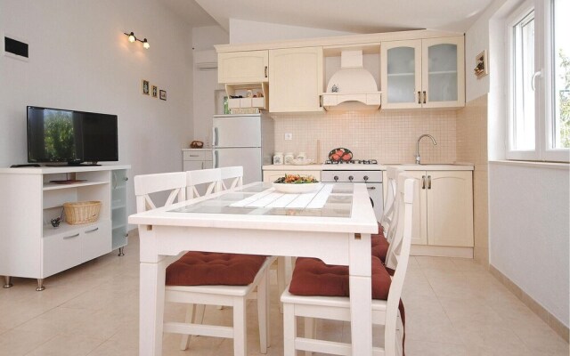 Nice Home in Kastel Novi With Sauna, Wifi and 4 Bedrooms