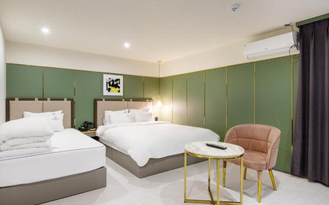 Brown Dot Hotel Minam