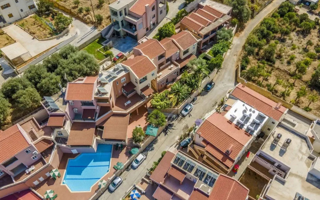 Theos village apartments