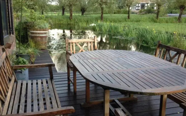 Holiday home Koetshuis de Polderruimte