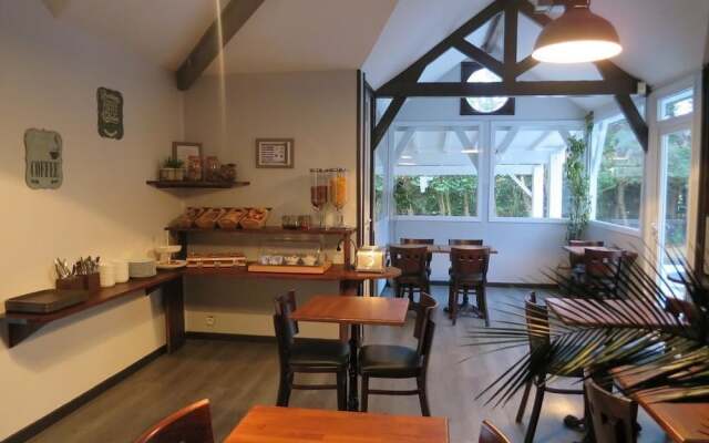 Hôtel Wood Inn Bordeaux Aeroport