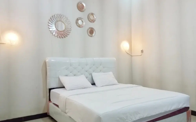 Urbanview Hotel Rifal Home Tegal