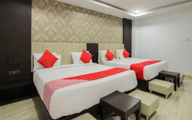Capital O 15964 NI Ambaari Suites