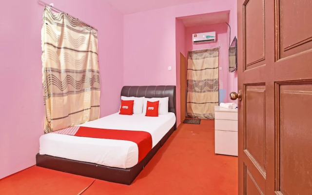 OYO 90664 Rabi Hotel