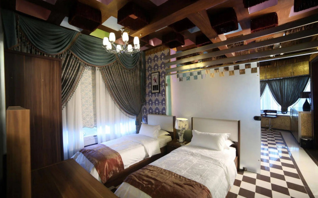 Roomi Suites Hotel