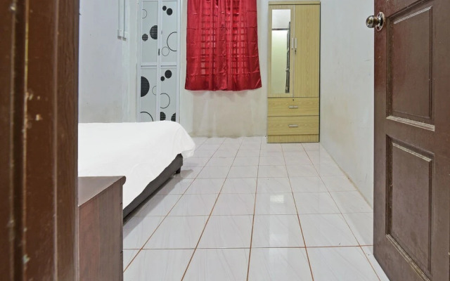 Oyo 90596 Casaria Inn