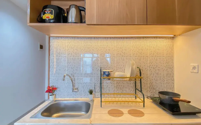 Simple Look Studio Apartment At Evenciio Margonda Near Station