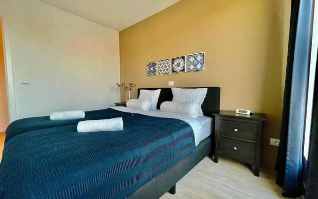 Modern 2BR 1.5 BA Near Diamond District by Oneluxstay