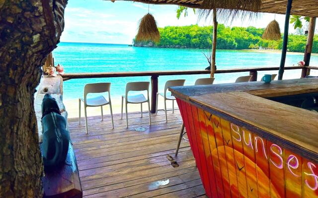 Sand And Tan Beach Hotel