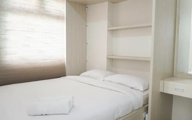 2BR Apartment with Sofa Bed at Green Pramuka City