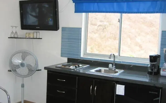 ApartaHotel El Oasis