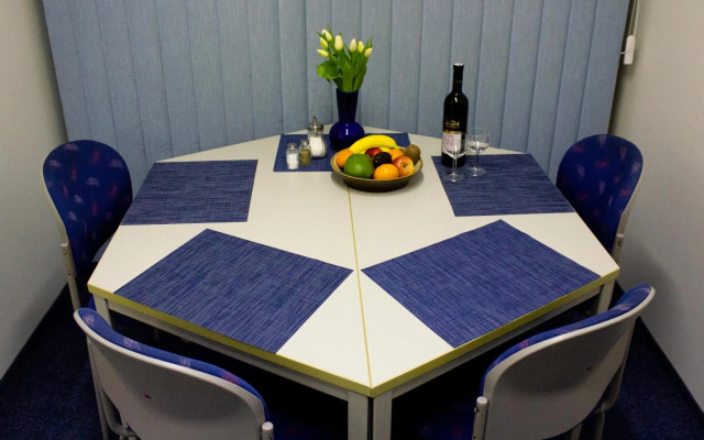 Blue apartment in beautiful English style garden with atmosphere