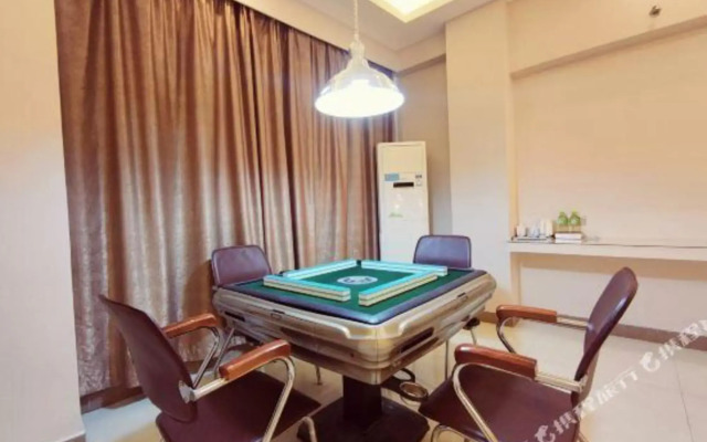 Youge Shangpin Hotel (Xinxing Times Square Bus Station)