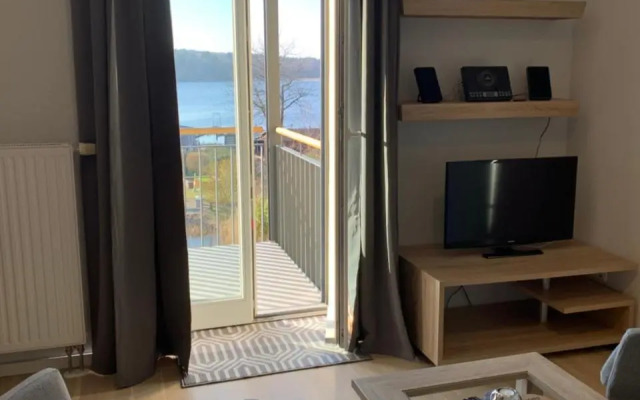 Einraumapartment mit Seeblickbalkon