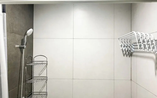 Monochromatic Studio At Lrt City Bekasi Apartment