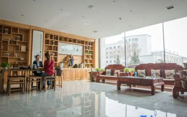 Yawan Impression Business Hotel (Songyuan Jinjiang Street store)