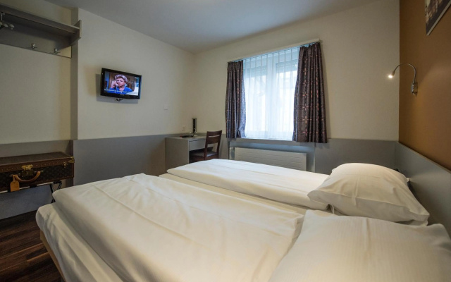 Alexander Guesthouse – Guest Rooms – Zurich