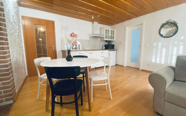 Garden Paradise Bled Apartments - garden, pond and castle view