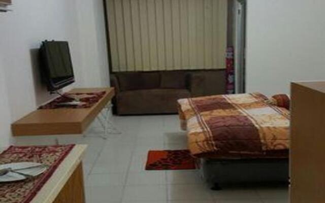 Apartment Emerald Tower By Kamara Rooms By Zuzu