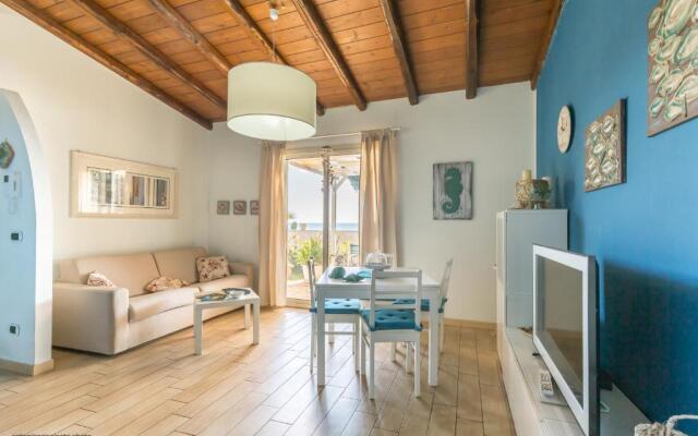 Blue house on the sea