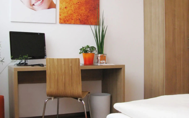 Orange Hotel und Apartments