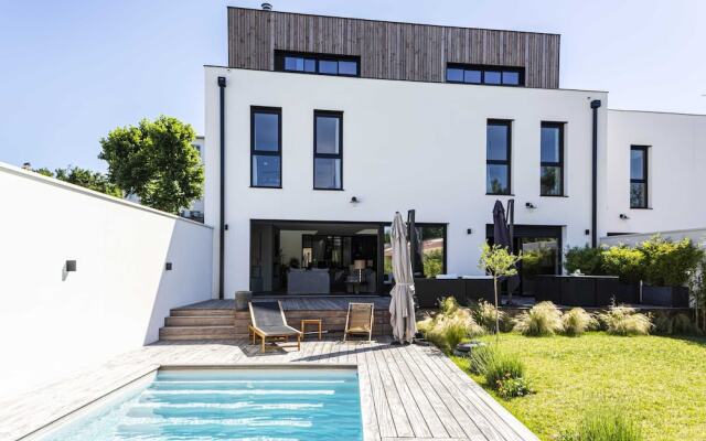 Stunning Home with Private Pool and Patio by GuestReady