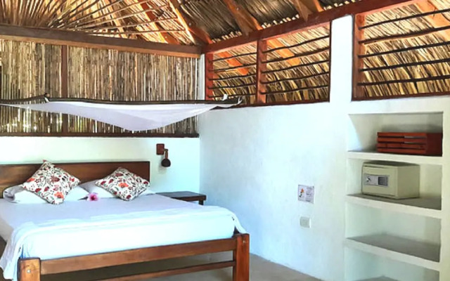 Cabañas Frente a la Playa IV