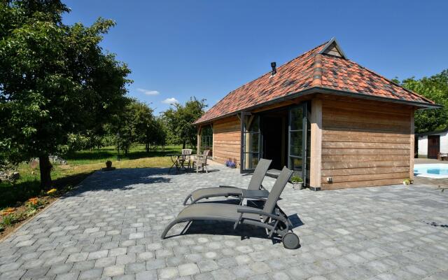 Spacious Holiday Home in Herveld with Pool