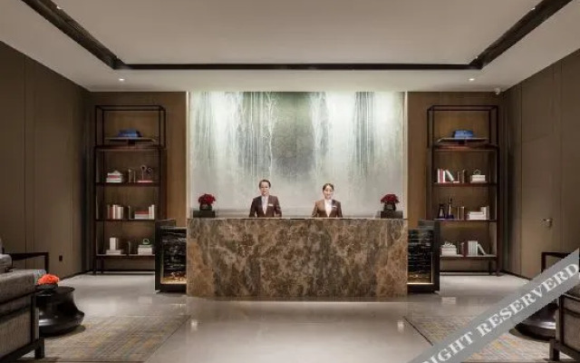 New Beacon Yunman Internation Hotel (Yingshan Tourist Center Chaxiang Small Town)