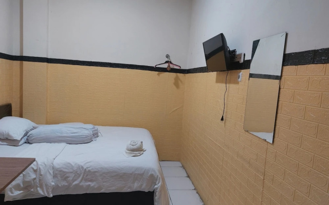 OYO 93332 Kharis Home Stay