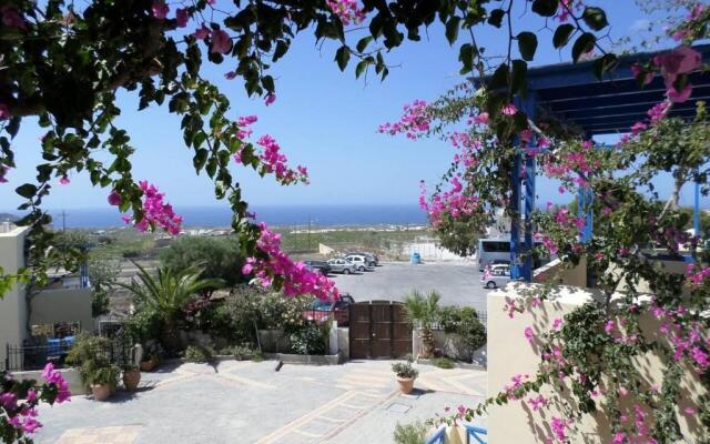 Santorious Flower Covered Apartment