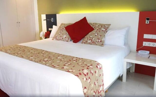 Magno Suites Hotel