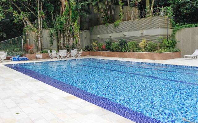 150m da praia com piscina aquecida e sauna