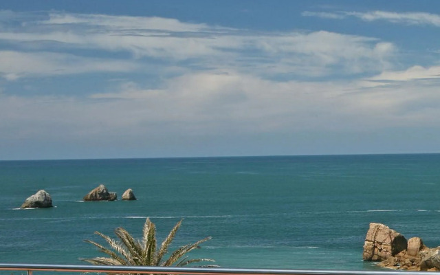 Apartamentos Playa de Portio