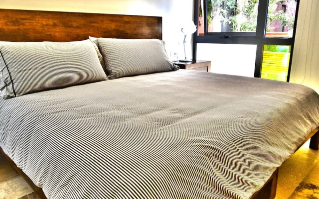 Chic Jungle 2 BR Condo by Happy Address