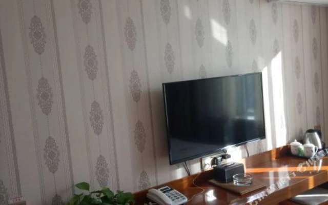 Zhangye Xinyue Shangpin Hotel (Hexi College)