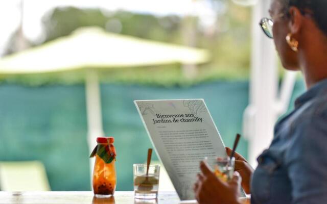 Les jardins de CHANTILLY -Bungalows avec jardins et piscines privées