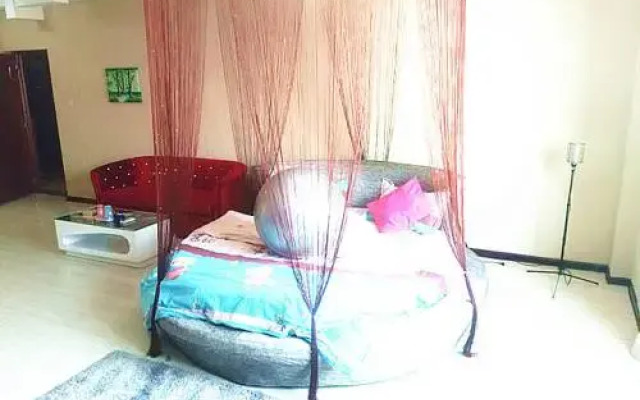 Tangtang Theme Apartment Holiday Hotel