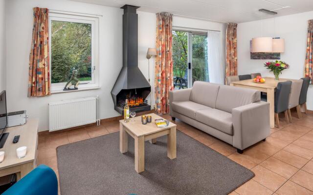 Nice holiday home with fireplace near the Drents-Friese Wold