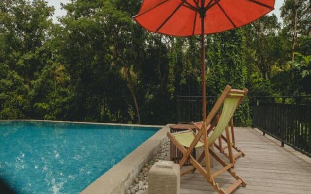 Sekar Arum Riverside Resort in Canggu by ZUZU