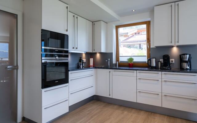 Opulent Holiday Home in Piesendorf with Sauna & Hot Tub