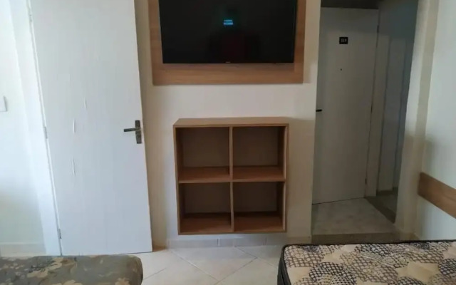 Kitnet com ar na praia das Astúrias