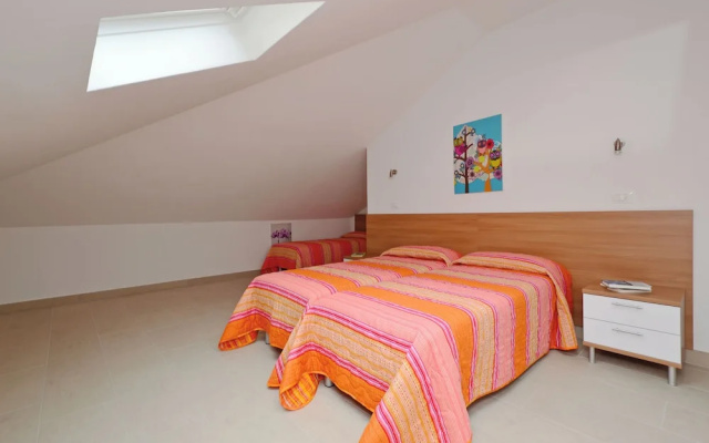 Charming Retreat Just Steps From the Beach