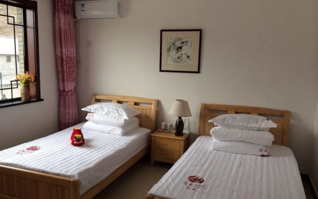 Xinyue Folk Farmhouse Inn