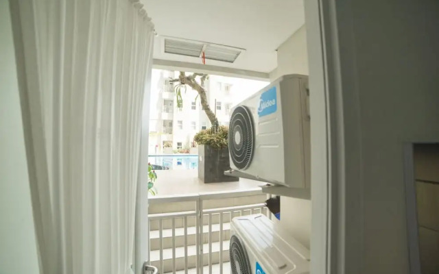 Cozy Apartment at Parahyangan Residence with Direct Access to Swimming Pool