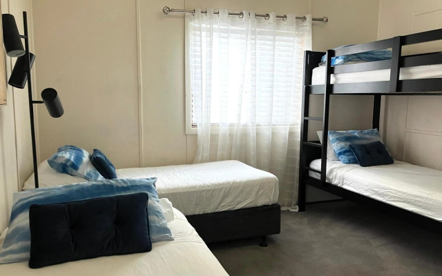 Shellharbour Beach Cottage - walk onto Patrolled beach with flags in summer