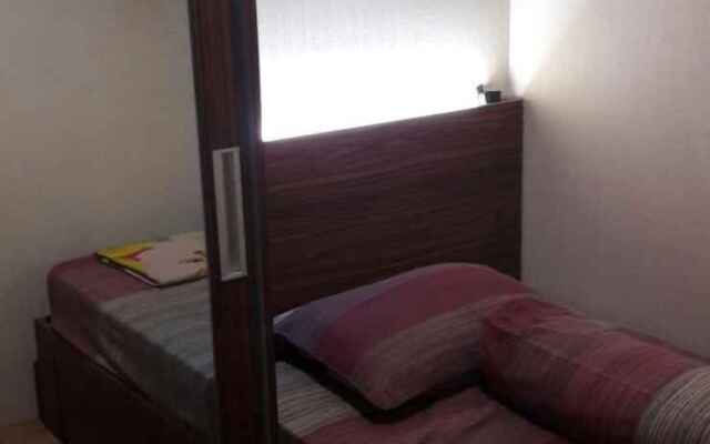 Ester Room Apartemen Kebagusan City