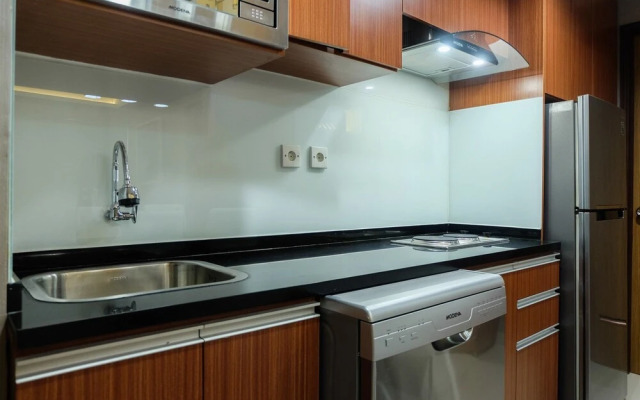 Comfortable 2BR @The Oasis Apartment By Travelio