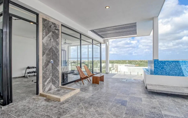 Mya Residence 206 at Aldea Zama